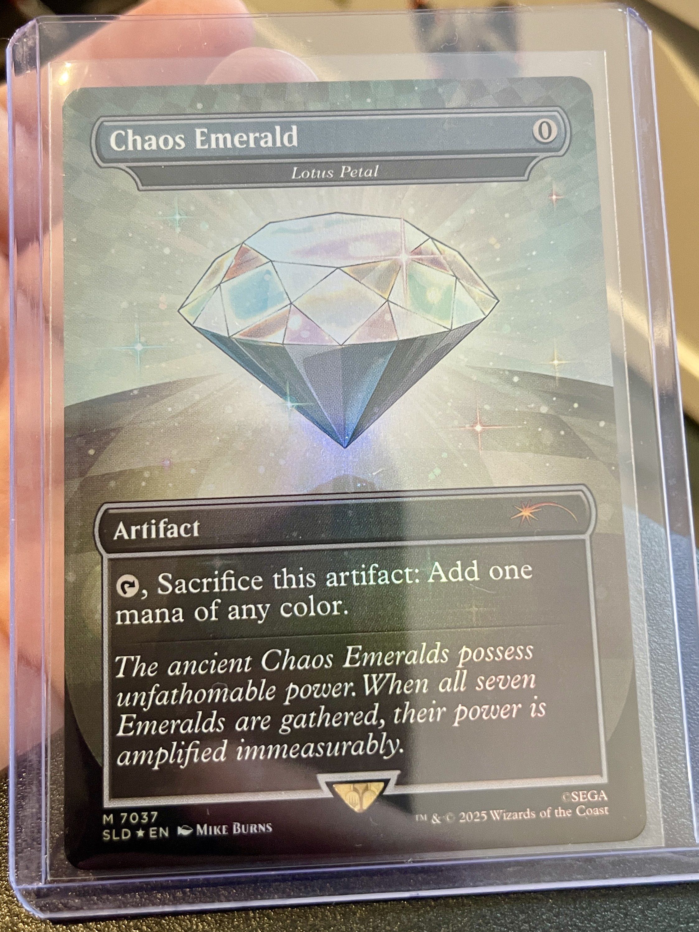 Magic the Gathering: Chaos Emerald - Lotus Petal (7037) - Secret Lair Paper Wolves Comics Magic the Gathering: Chaos Emerald - Lotus Petal (7037) - Secret Lair Paper Wolves Comics